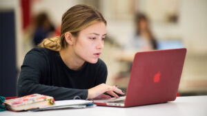 Student working at laptop